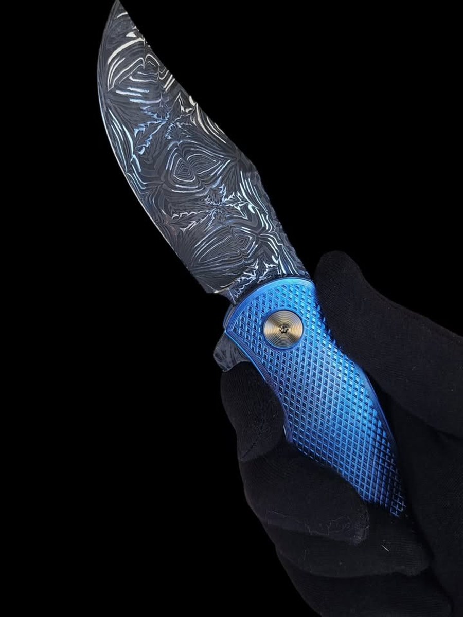 Blue Diamond — Damascus · Blue anodised