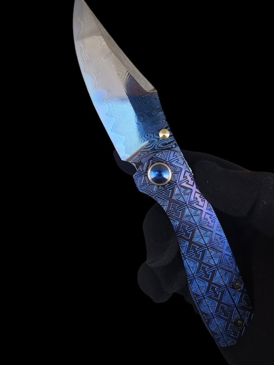 Celtic Knot — Damascus · Violet anodised